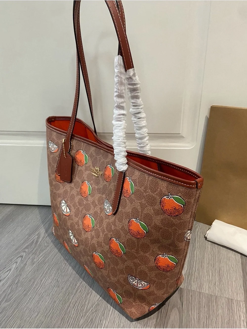 Coach Brown Canvas Tote with Orange Fruit Print